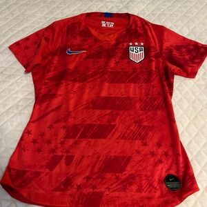 Nike Red Soccer Jersey with Star Pattern
